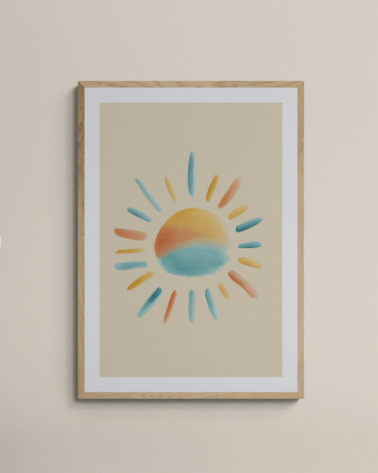 Framed artwork of a colorful sun on a beige wall